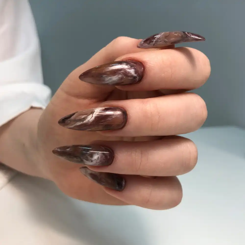 Fingertips banner Multicolored manicure close up. Young woman hands with pastel manicure.Bright multi-colored design of manicure